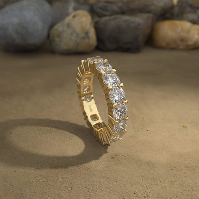 Designer cushion eternity band in yellow gold craftsmanship
