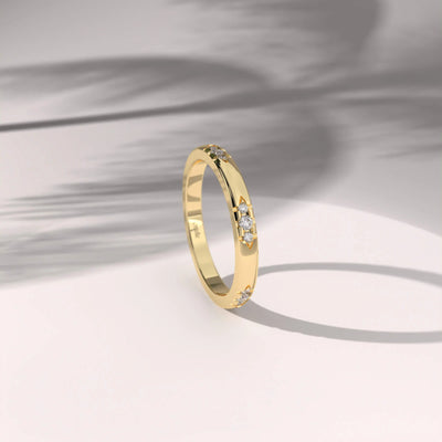 Handmade round wedding band with minimalist yellow gold style
