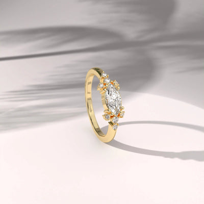 Unique design Art Deco ring with marquise moissanite center
