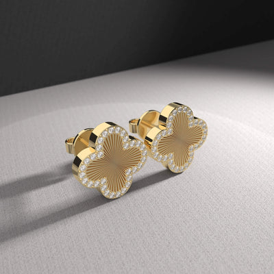 Elegant clover flower studs in yellow gold with round stones
