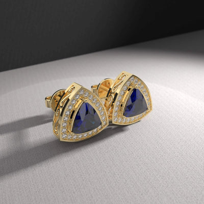 Blue sapphire and moissanite stud earrings with prong setting
