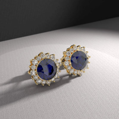 Dainty blue sapphire stud earrings handmade in yellow gold
