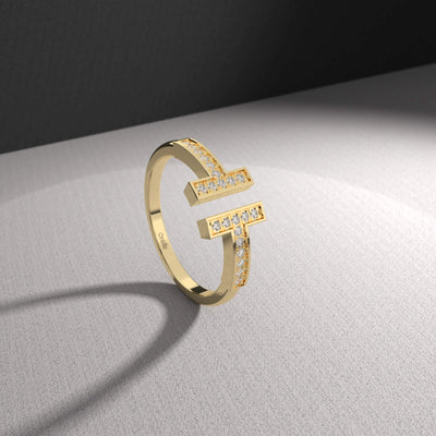 Elegant round cut engagement ring with open cuff band
