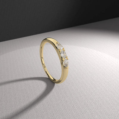 Dainty oval cut moissanite promise ring with a classic prong setting
