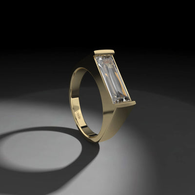 Unique design signet ring featuring a baguette cut stone
