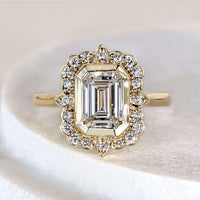 Bezel Set Emerald Cut Diamond Engagement Ring With Cathedral Setting