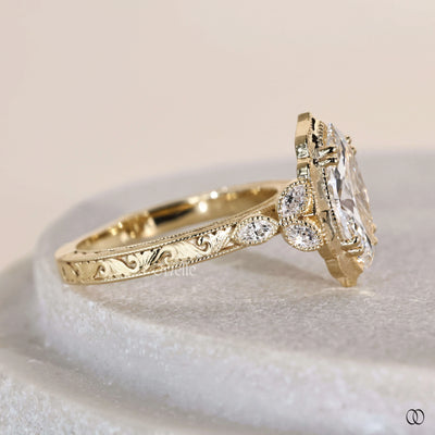 Unique engagement ring featuring marquise cut diamond
