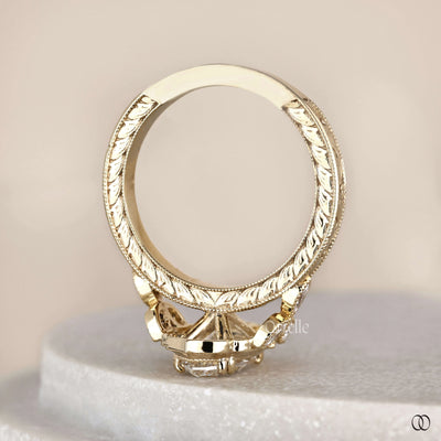 Double prong ring securing marquise cut diamond
