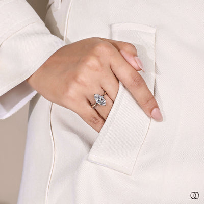 Lab grown marquise engagement ring with unique handmade setting
