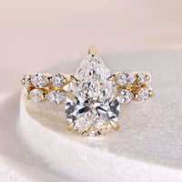 Pear Cut Diamond Engagement Ring With Marquise And Round Cut Band