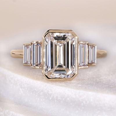 bezel set engagement ring emerald cut diamond ring
