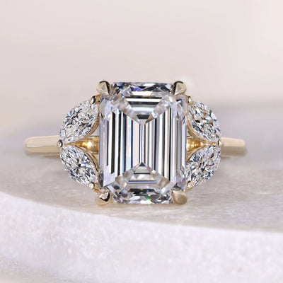 cathedral setting emerald cut engagement ring
