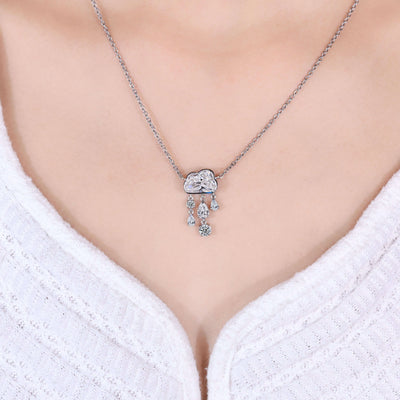 cloud cut diamond pendant with pear and round stones in gold
