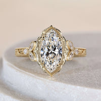 Marquise Engagement Ring With Vintage Milgrain Halo
