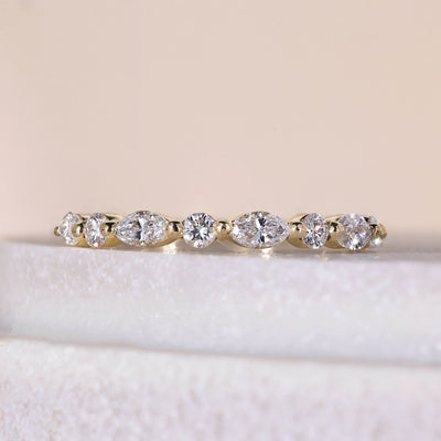half eternity marquise and round diamond wedding band in gold
