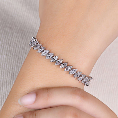 marquise diamond tennis bracelet in white gold prong setting
