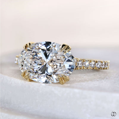 Antique engagement ring inspired east west oval design
