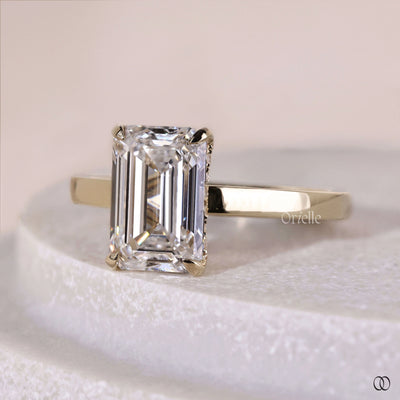 Handmade emerald cut diamond ring with claw prong setting
