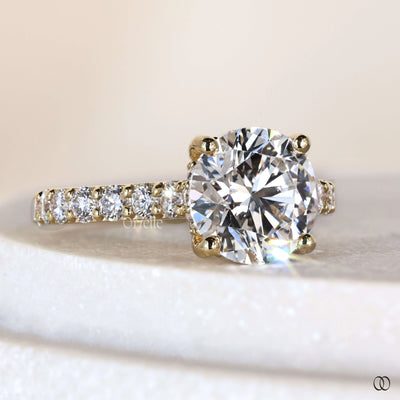 Handmade round diamond ring with classic 4 prong
