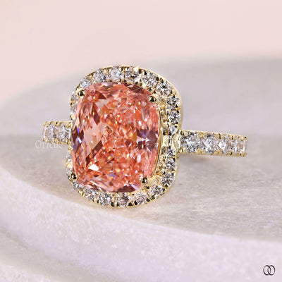 Yellow gold cushion cut diamond engagement ring
