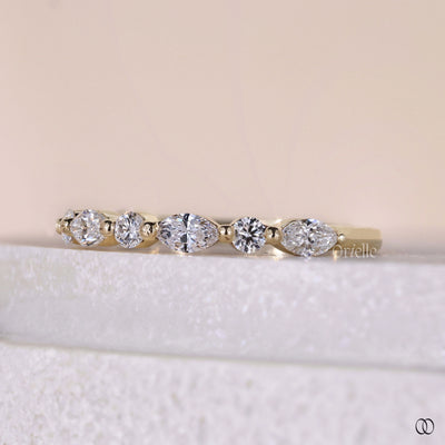 lab grown marquise and round diamond wedding band design
