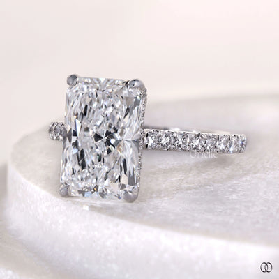 Hidden halo engagement ring with radiant cut lab grown diamond
