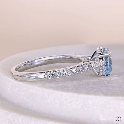 Unique heart shaped engagement ring with pave band in white gold
