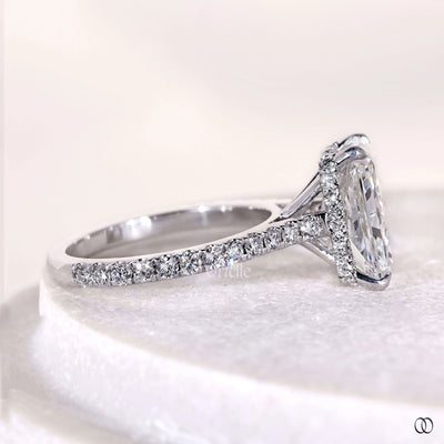 Handmade radiant cut diamond ring with claw prong setting
