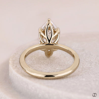 Unique setting marquise diamond ring with lab grown center stone
