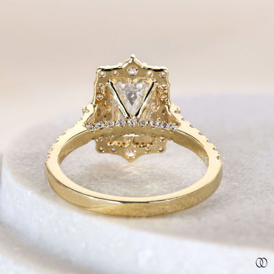 Timeless emerald cut engagement ring with halo diamond ring sparkle
