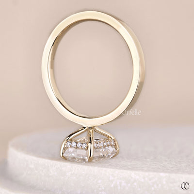 Lab grown emerald cut diamond ring with claw prong solitaire
