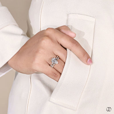 claw prong ring pear cut pave diamond band

