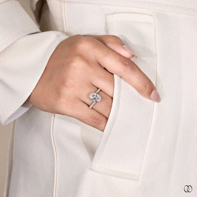 Yellow gold ring featuring oval cut engagement ring
