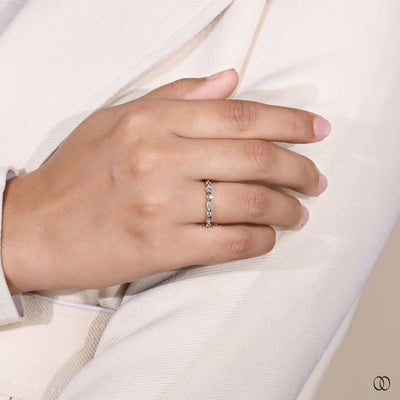prong setting marquise and round half eternity wedding band
