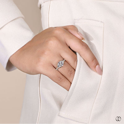 Unique oval diamond engagement ring set east west
