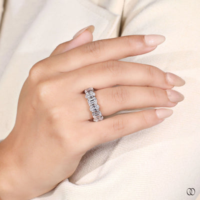 shared prong band emerald cut wedding ring
