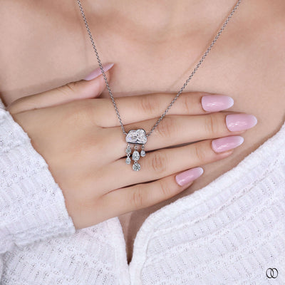 delicate cloud diamond pendant on dainty gold chain
