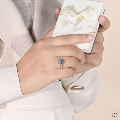 Unique heart shaped diamond ring with cathedral white gold band
