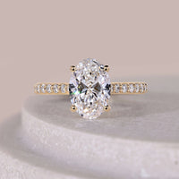 Cathedral Style Oval Cut Hidden Halo Engagement Ring For Her