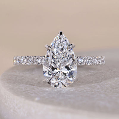 Unique Pave Style Pear Shaped Diamond Engagement Ring