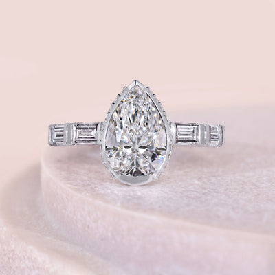 5 stone diamond ring pear cut design
