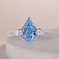 14K White Gold Blue Pear Cut Three Stone Engagement ring