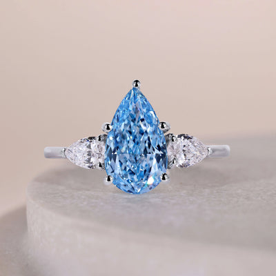 Pear cut diamond ring with an elegant prong setting
