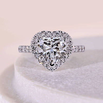 Heart shaped engagement ring with elegant diamond setting
