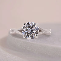 Stunning Round Cut Twisted Shank Ring With 4 Prong Setting