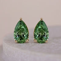 18K Vibrant Green Pear Diamond Earrings With Basket Setting