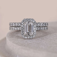 Halo Set Emerald Cut Diamond Ring With Matching Half Eternity Band
