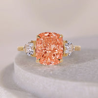 Orange Cushion Cut Ring With Side Trillion Stone