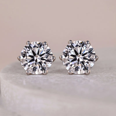 round brilliant cut diamond earrings white gold
