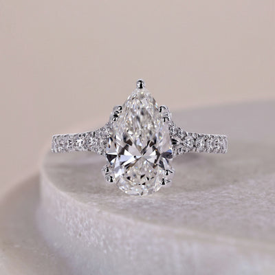 Pear cut diamond engagement ring with an elegant setting and sparkling center stone
